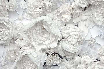 Decorative background from white paper flowers