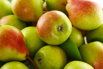 Heap of ripe tasty pears close up