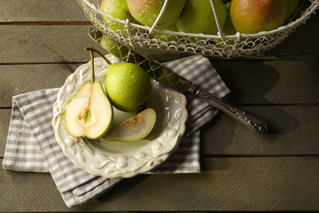 Ripe tasty pears on table close up