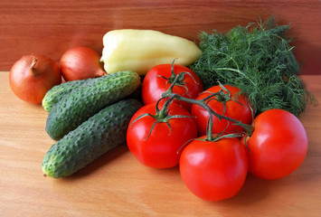 Fresh organic tomatoes, cucumbers,. pepper, dill, onion