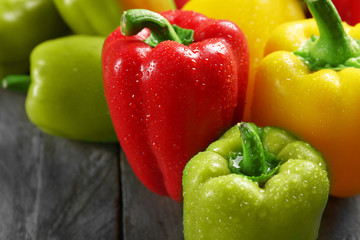 Group of wet colorful peppers, closeup