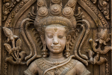 Old carving on the wall in a temple