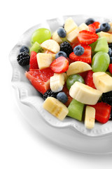 Fresh fruit salad, isolated on white