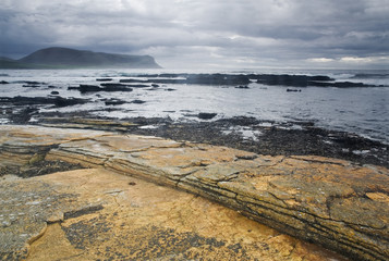 Colorful Warbeth Bay, Orkney with a storm coming