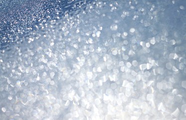 Obraz premium Icy blue cold abstract sparkling shinyempty background natural bokeh effect shallow focus