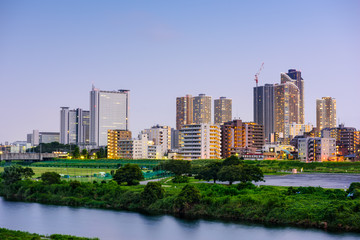 Kawasaki, Japan Skyline at the Tamagawa River.