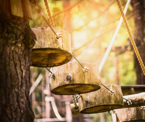 Rope road of logs in climbing forest