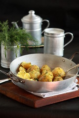 potatoes with dill on the table
