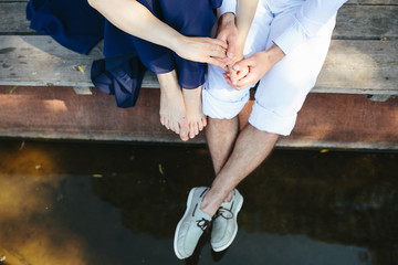 man and woman at the lake