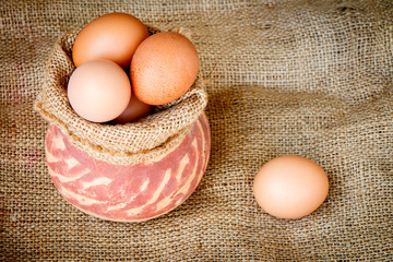 Raw egg put on old sack