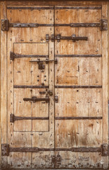 Ancient wooden door with metal locks