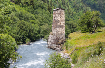 Old tower by the river in Svaneti