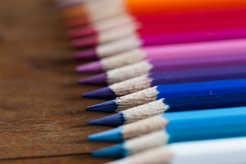 Fototapeta premium color pencils on wooden table