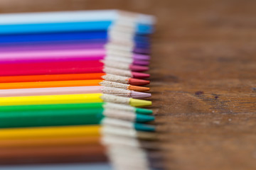 Fototapeta premium color pencils on wooden table