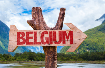 Belgium wooden sign with landscape background