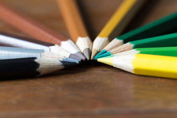 Obraz premium color pencils on wooden table