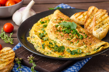Herb omelette with chives and oregano sprinkled with Herb omelette with chili flakes - 88809359