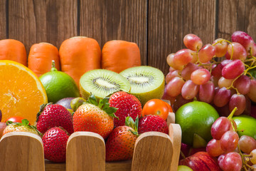 Close-up strawberry with fresh fruits and vegetables