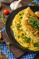 Herb omelette with chives and oregano sprinkled with Herb omelette with chili flakes - 88810985