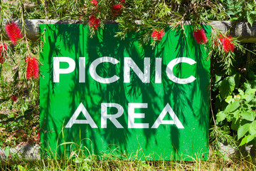 Picnic Area Sign With Plants