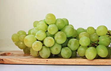 White green table grapes wet wooden board fresh cluster fruit