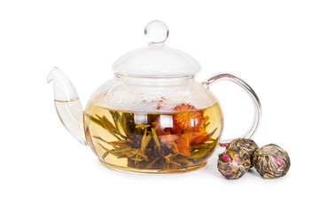 Chinese flowering tea in a glass teapot