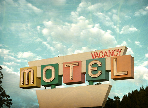 Aged And Worn Vintage Photo Of Motel Vacancy Sign