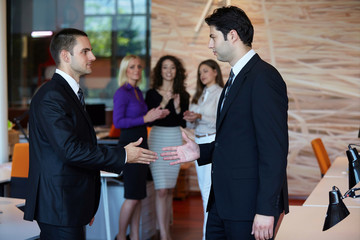 Business people shaking hands