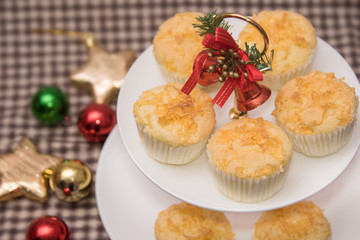Thailand dessert.Gold egg yolk thread topped on cup cake