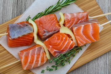 Raw salmon skewers