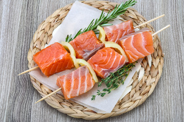 Raw salmon skewers