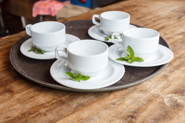Empty coffee cupon wooden table