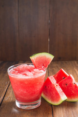 watermelon smoothie on wooden background