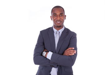 African american business man with folded arms over white backgr