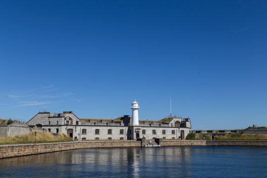 Copenhagen, Denmark - August 9, 2015: Photograph of Trekroner fort at the entrance of Copenhagen harbour on a summer day.