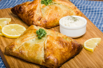 Pastry wrapped salmon filelt with lemon