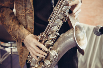 a man playing the saxophone