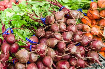 Red beets displayed at the market