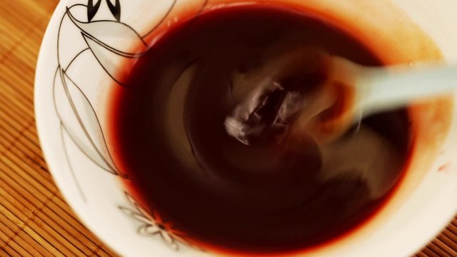 HD 1080 static: strawbery jam with red vine sweet sauce - close up; 