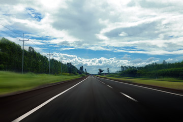 asphalt road and sky in thailand with motion blur