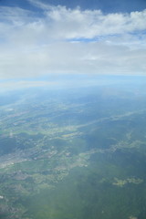 Fototapeta premium The Hitachinaka-shi, Ibaraki vicinity which looks dim by the rainy season air. Japan seen from the sky. 