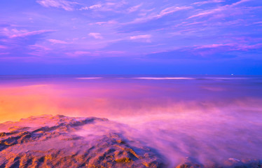Fototapeta na wymiar Sunrise on the beach of andaman sea.