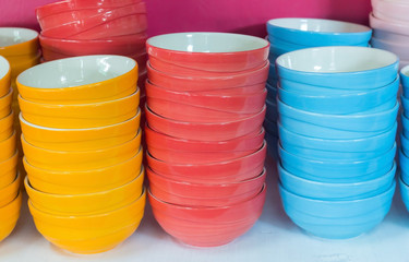 A lot of colorful bowls in a shop