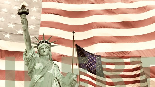 Vintage photo of Lady Liberty with American flags in the background. Sliding text Libertyin the same color as Lady Liberty is edited by noise effect.