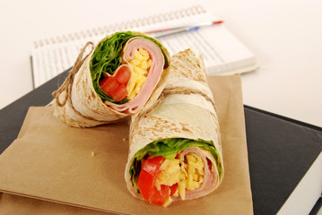 School lunch: ham and cheese wrap sandwich