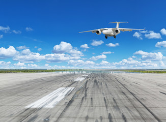 Airplane landing on runaway in the airport.