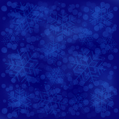 Fototapeta na wymiar Abstract blue background with snowflakes