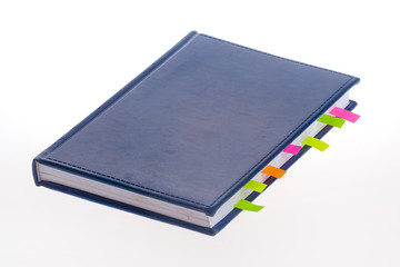 Dark blue notebook and bookmarks