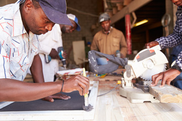 Men at work in a carpentry workshop, South Africa