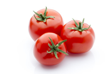 Tomato on the white isolatd background.